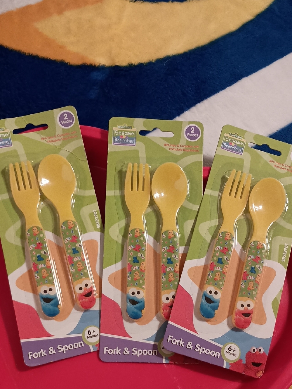 Sesame Street Sesame Beginnings 2-Piece Utensil Set, which includes a fork and a